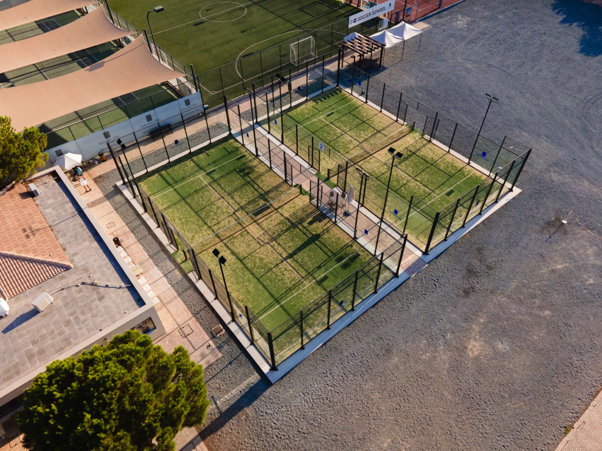 Aerial of the padel courts at Aphrodite Hills, the first padel courts in Cyprus, captured by Backlight Media