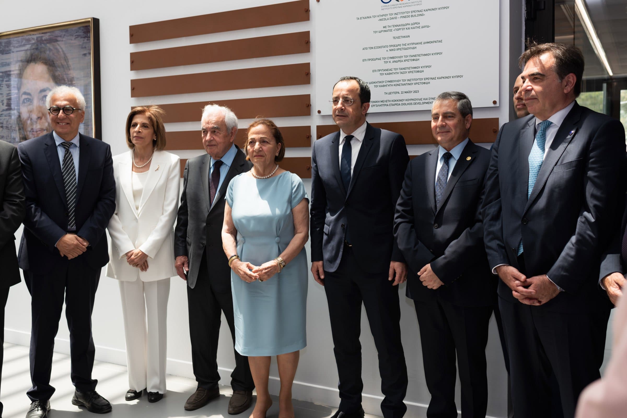 The President of the Republic, benefactors and officials at the unveiled dedication plaque at the Cyprus Cancer Research Institute (CCRI) grand opening, documented by Backlight Media