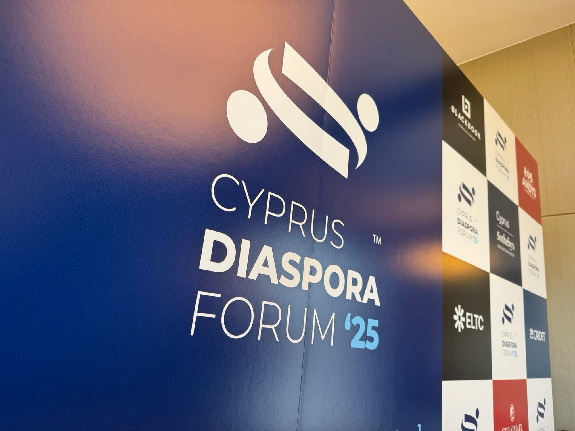 The Cyprus Diaspora Forum '25 branded backdrop in Limassol, Cyprus, covered by Backlight Media