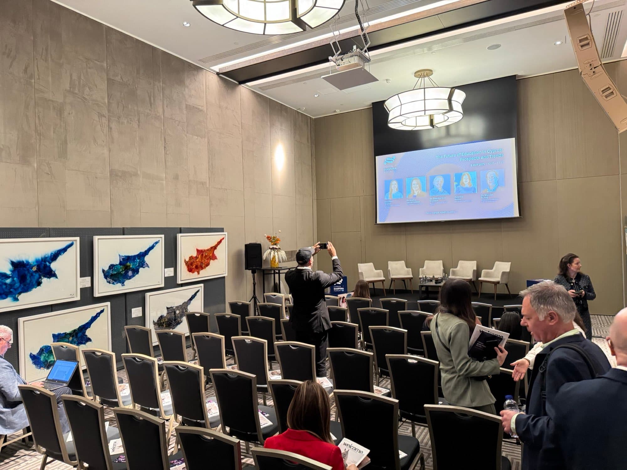 Audience seated for a session at the Cyprus Diaspora Forum, captured by Backlight Media