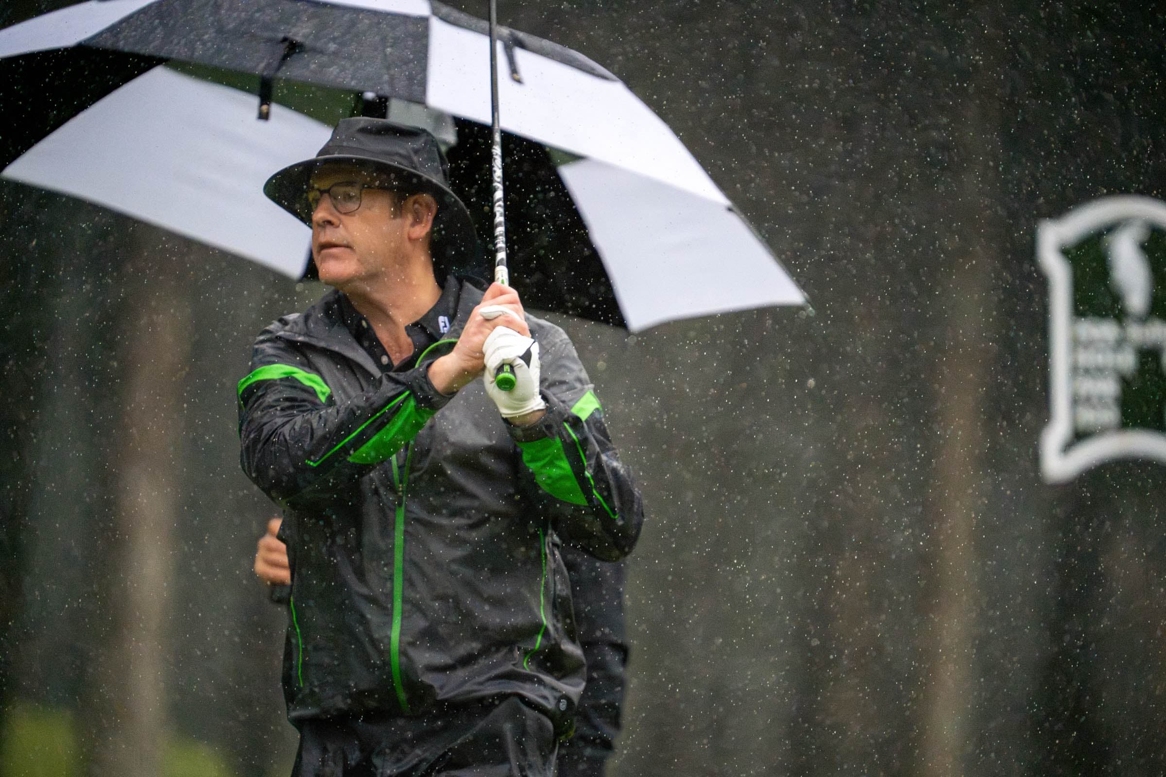A player teeing off under an umbrella beside PGA signage at the St James's Place event, Antalya Golf Club, Turkey, by Backlight Media
